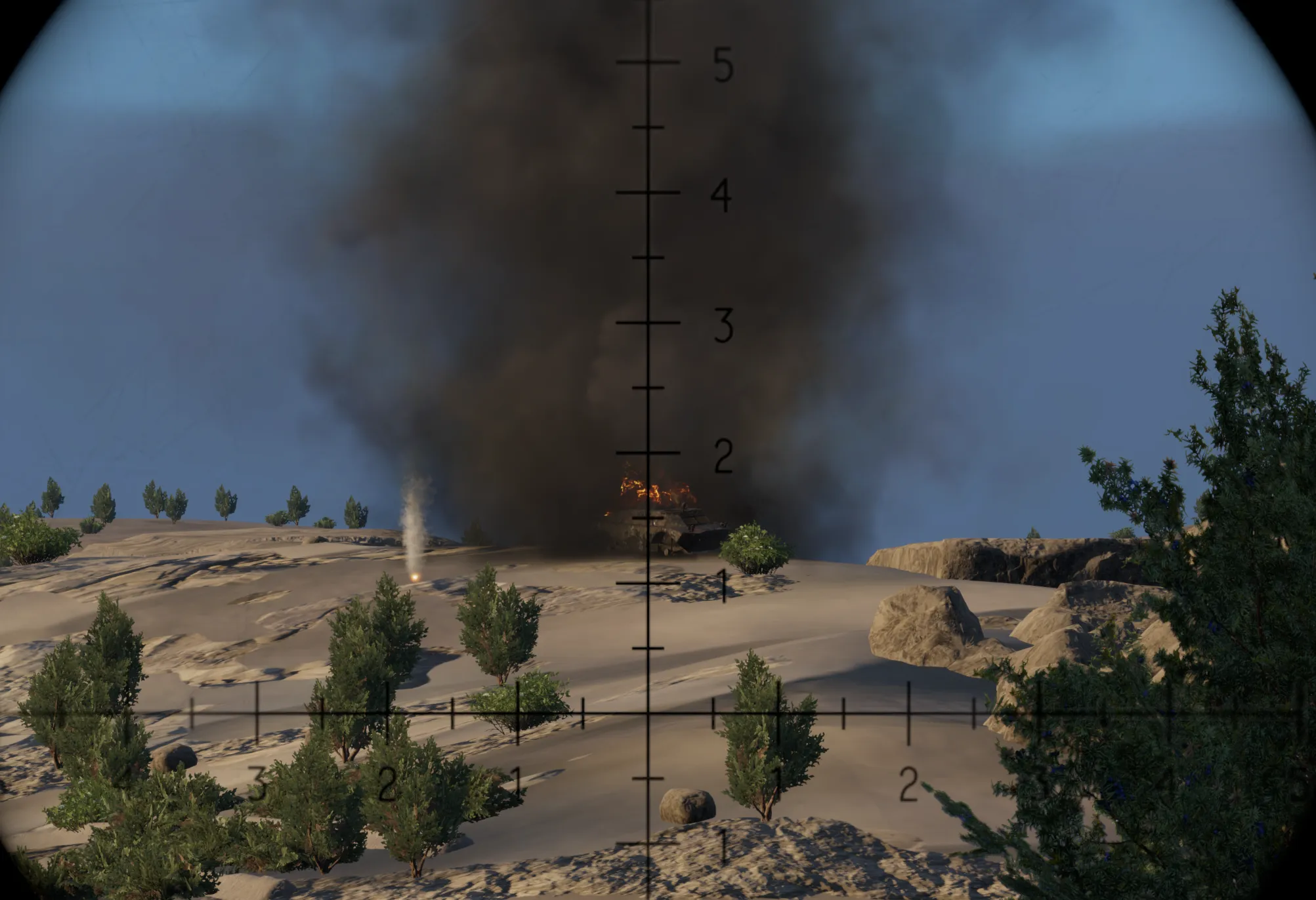 An armoured vehicle blowing up through then lense of binoculours.