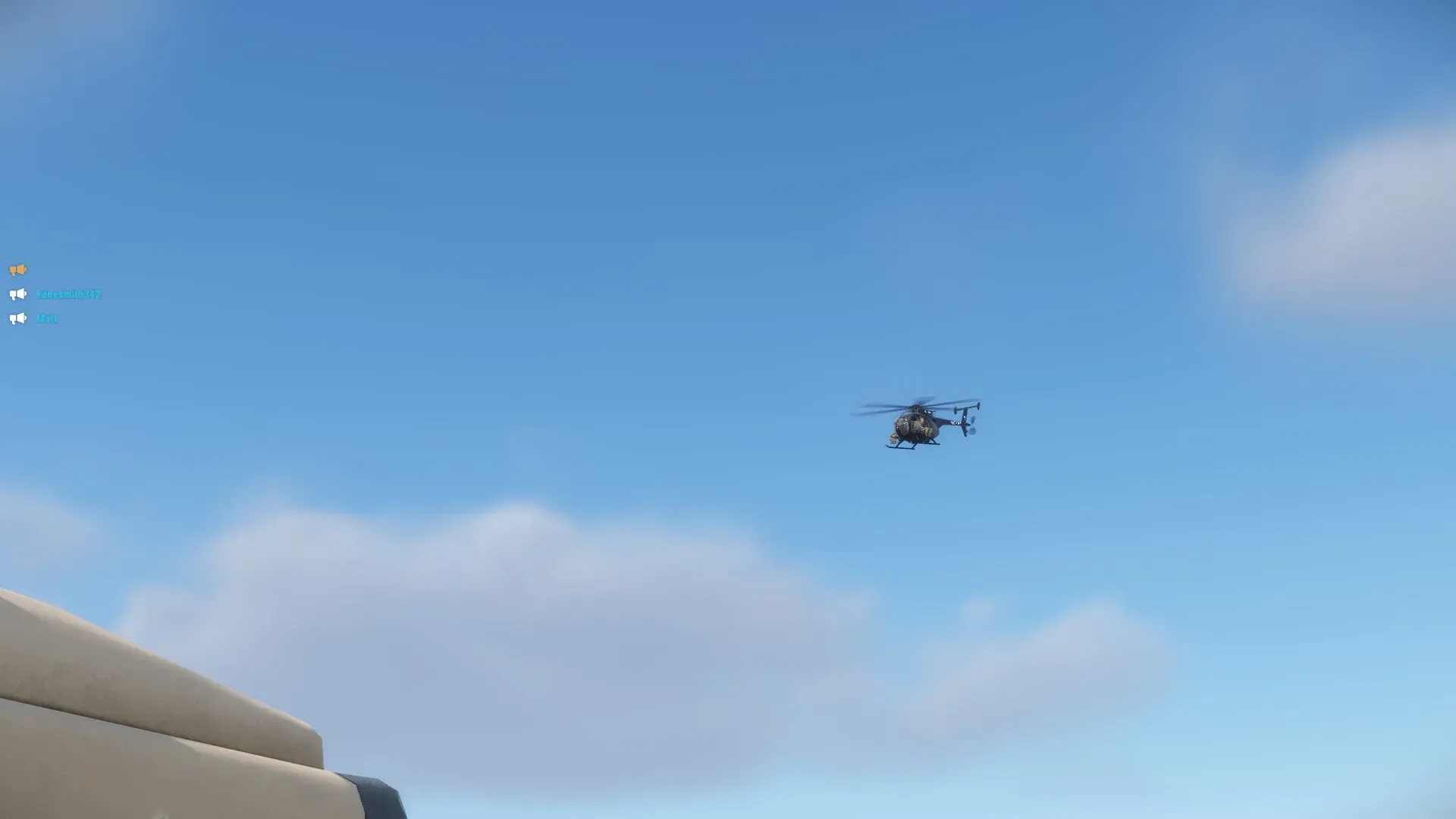 A chopper in a blue sky.