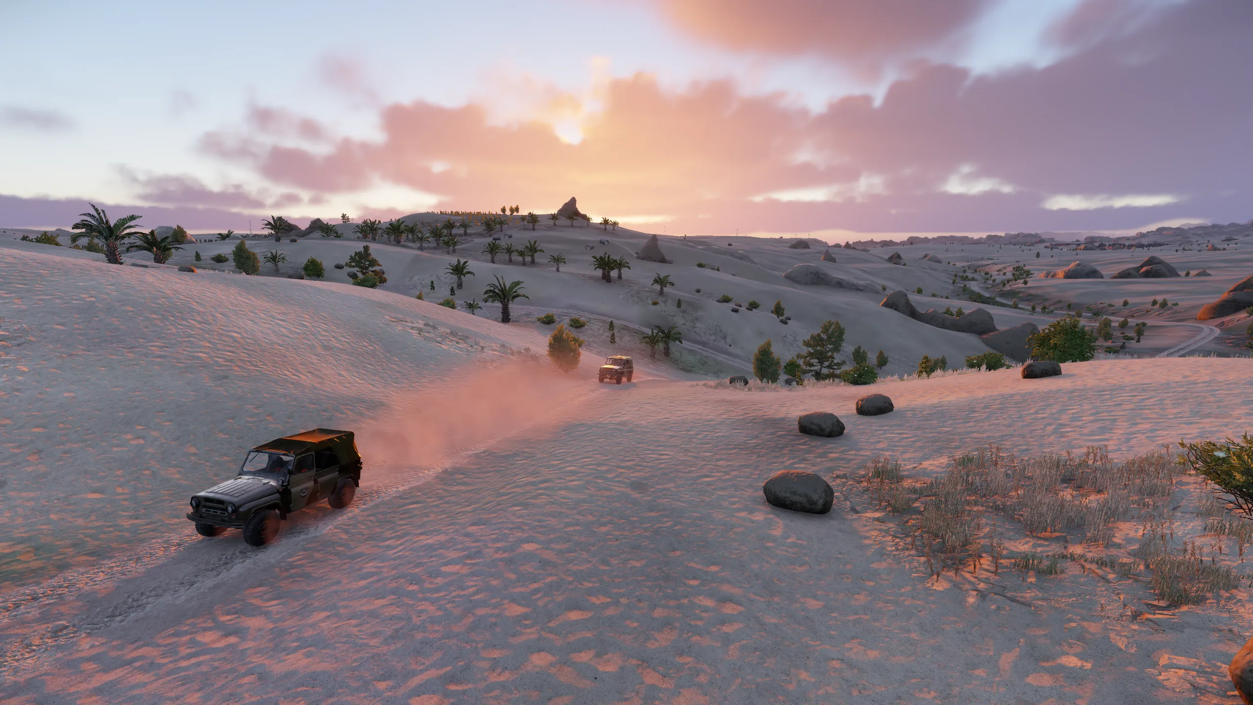 2 UAZ's driving through the desert